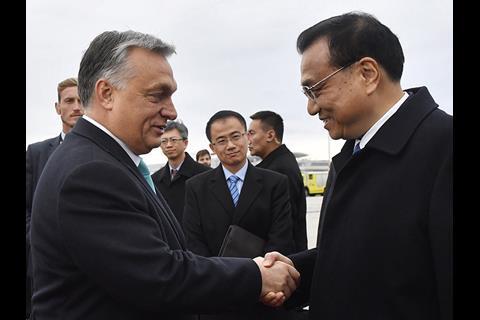 Hungary’s Prime Minister Viktor Orban  welcomes Chinese Premier Li Keqiang to Budapest for the sixth 16+1 summit on November 26. (Photo: Tibor Illyes/EPE-EFE/REX/Shutterstock)